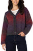 Woman wearing a multicolored cardigan with a white background