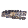 Decorative belt with gold studs and a central button on a white background